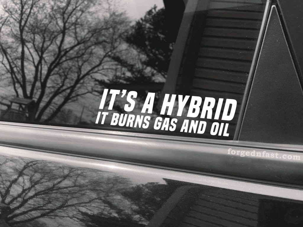 it s a hybrid it burns gas and oil sticker