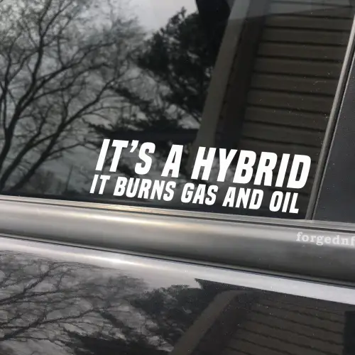 it s a hybrid it burns gas and oil sticker